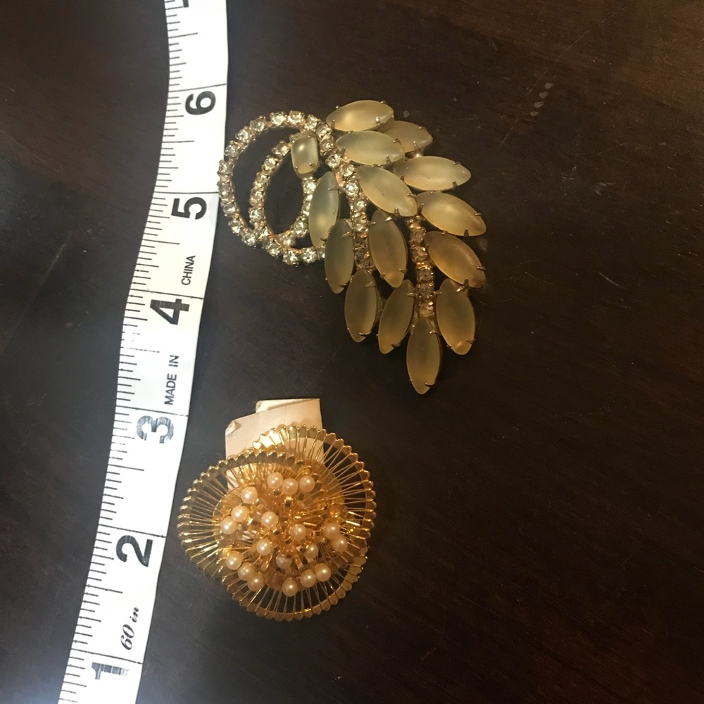 2 brooches